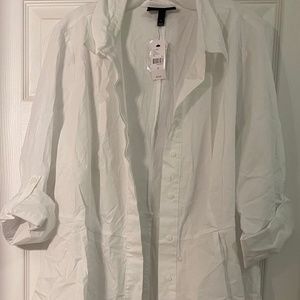 Long sleeve button up peplum style Hi Low shirt